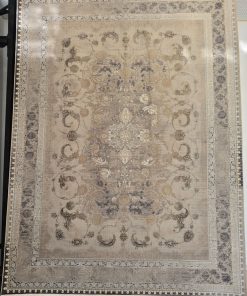 فرش ماشینی 1200 شانه کاشان طرح وینتیج ترنم رنگ کرم نسکافه‌ای گل برجسته