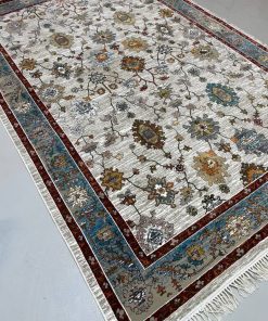 فرش ماشینی 700 شانه کاشان طرح فیروز بهار زمینه کرم تراکم 2550