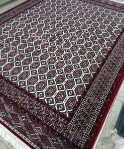 فرش ماشینی 700 شانه کاشان طرح بازوبند کرم زرشکی تراکم 2550