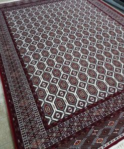 فرش ماشینی 700 شانه کاشان طرح بازوبند کرم زرشکی تراکم 2550
