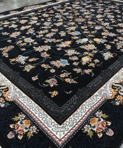 فرش ماشینی 700 شانه کاشان طرح جانان زمینه سرمه‌ای 10 رنگ