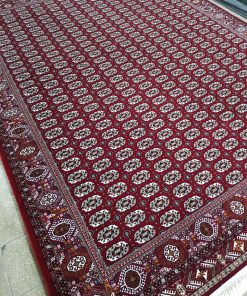 فرش ماشینی 700 شانه کاشان طرح ماری گل ترکمن زمینه روناسی لاکی
