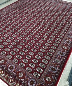 فرش ماشینی 700 شانه کاشان طرح ماری گل ترکمن زمینه روناسی لاکی