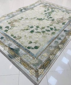 فرش ماشینی ۱۲۰۰ شانه کاشان طرح میلان ترمه‌ای سبز افشان گل برجسته